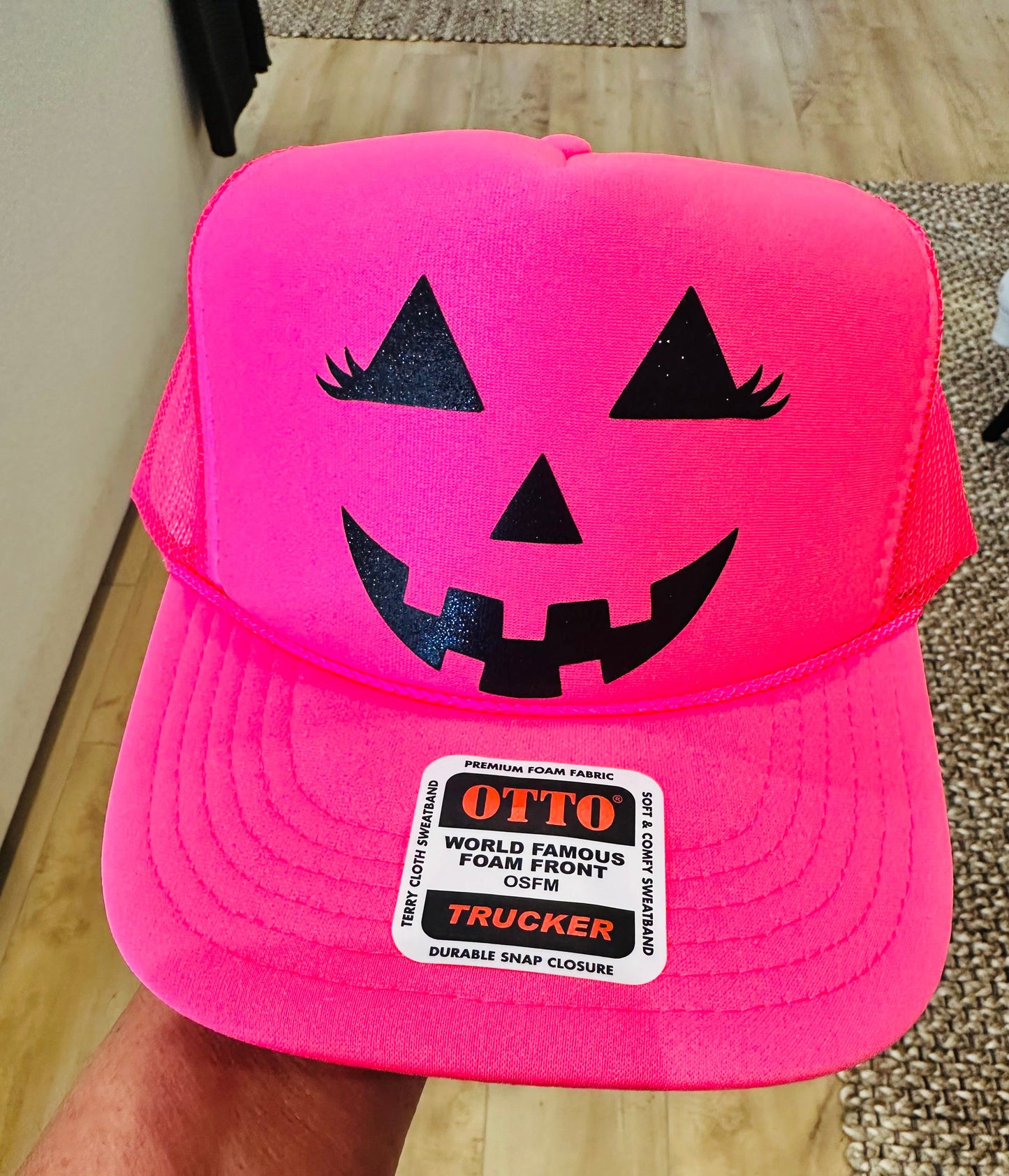 3D Glitter Puff Black Vinyl Jack o Lantern Face on Neon Pink Foam Trucker Hat