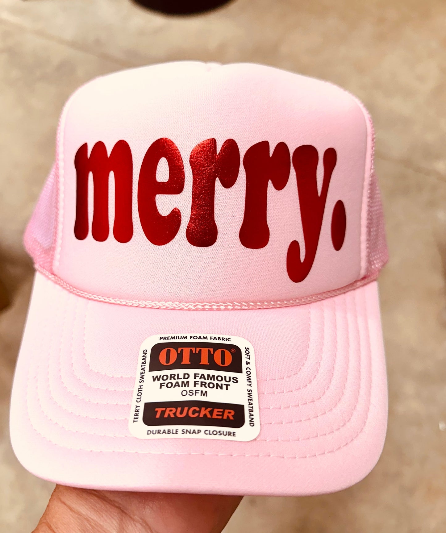 Merry red metallic puff vinyl on a soft pink hat